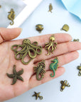 100 Gram Assorted Antique Ocean Themed Charms Bronze Ocean Fish Sea Creatures Beads Pendants for Jewelry Making and Craft Making