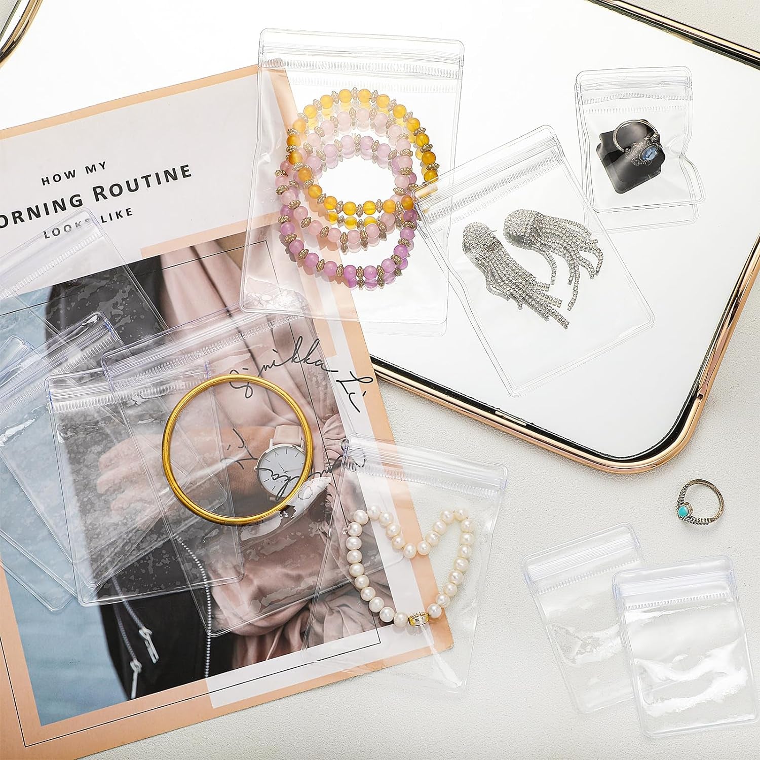 200 Pcs anti Tarnish Strips with Clear Plastic Jewelry Bags Sets, 100 Assorted Size Transparent Jewelry Storage Bags and 100 anti Tarnish Strips for Packaging Jewelry Rings Earrings (3 Sizes)