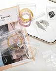 200 Pcs anti Tarnish Strips with Clear Plastic Jewelry Bags Sets, 100 Assorted Size Transparent Jewelry Storage Bags and 100 anti Tarnish Strips for Packaging Jewelry Rings Earrings (3 Sizes)