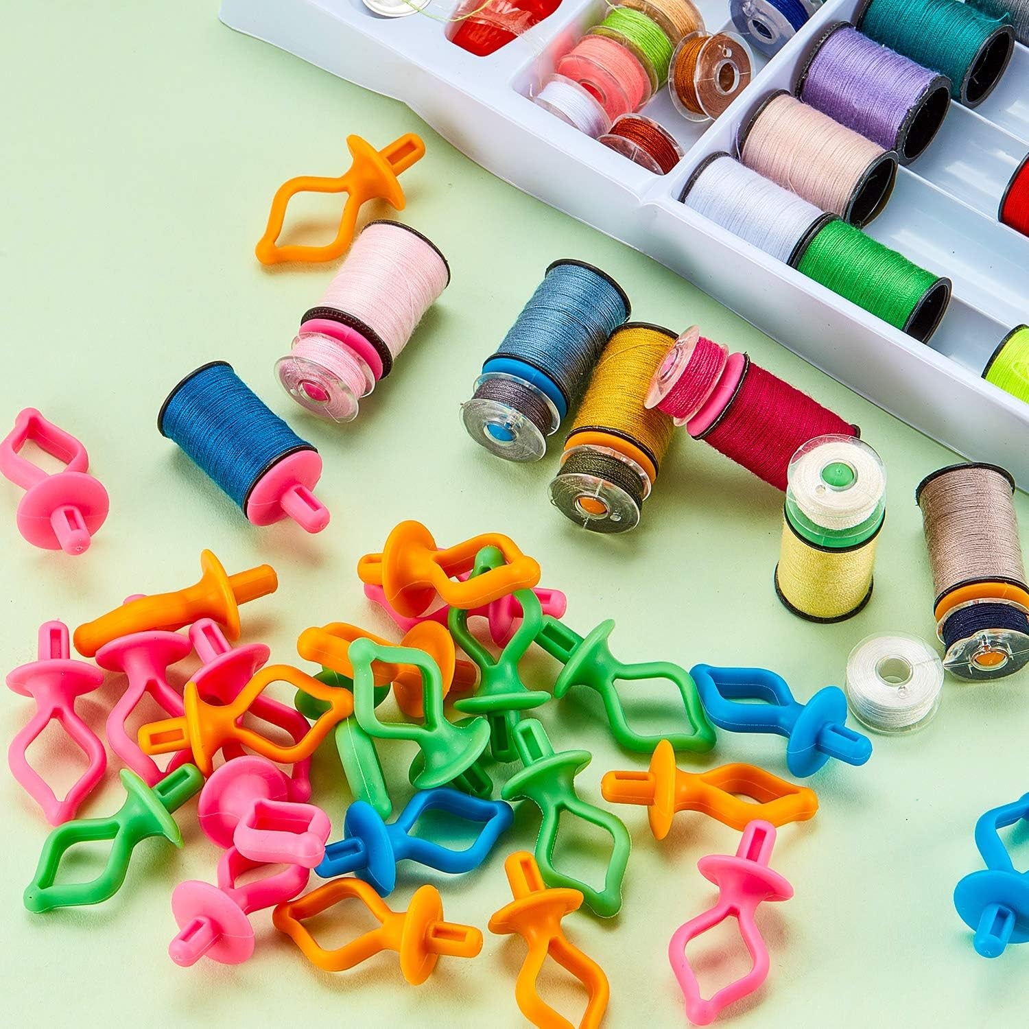 60 Pieces Bobbin Holders for Thread Spools Bobbin Clips Bobbin Thread Holder on Spool Tops Bobbins Sewing Machine Quilting Supplies Spool and Bobbin Holder for Embroidery with 4 Colors