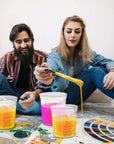12 Pack Paint Mix Cups with Lids and 50 Sticks - 64 Oz Graduated Paint Mixing Cups Plastic Epoxy Measuring Cups with Calibrated Mixing Ratios on Side of Cup for Activators, Thinner, Resin